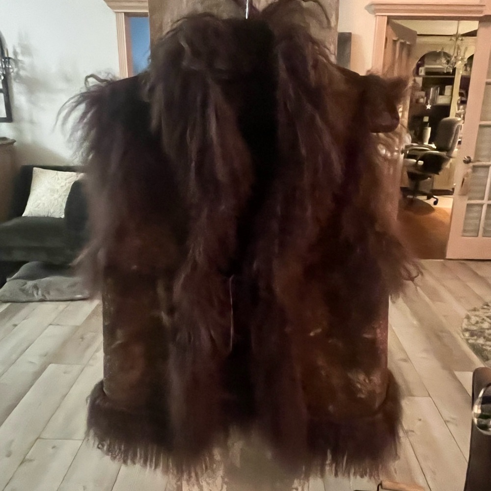 Custom made fur and leather reversible vest.